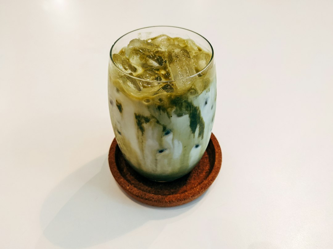 a-glass-cup-on-a-table-b-xyqe69eec